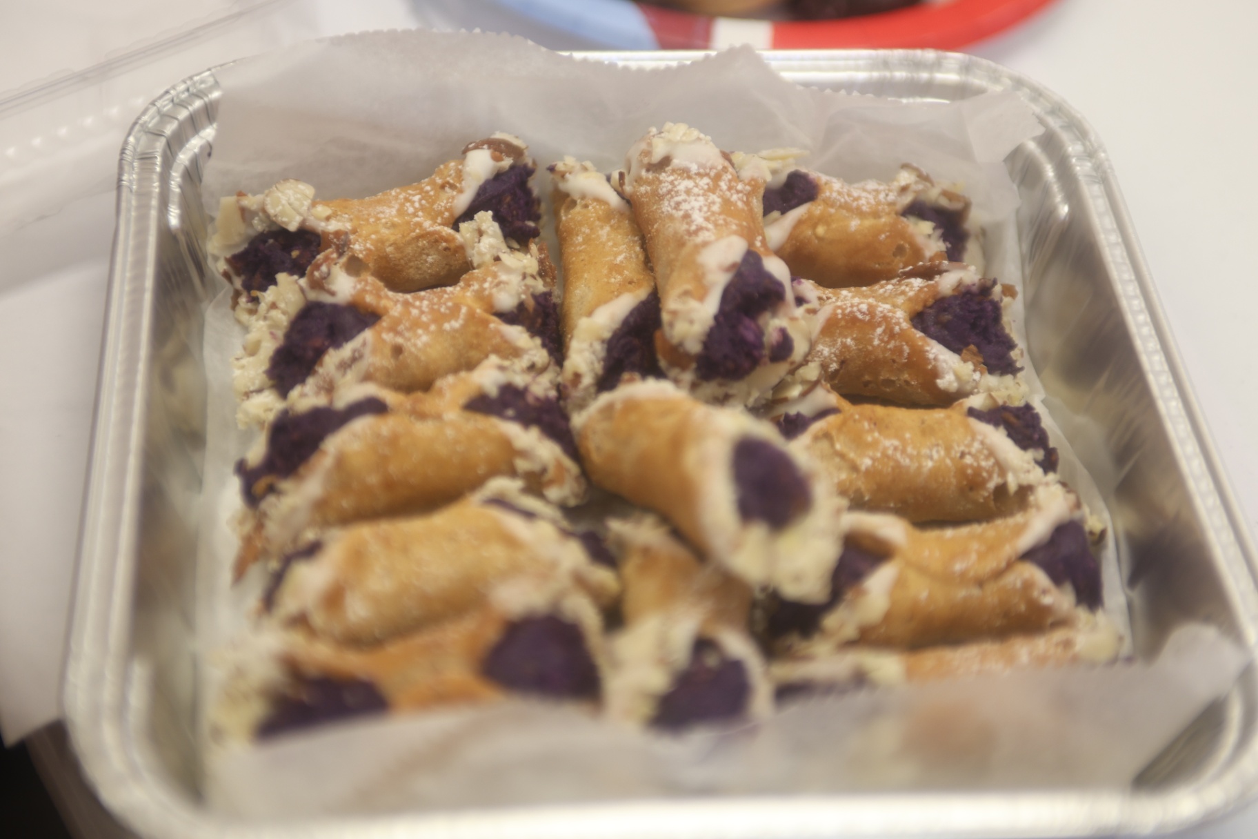 Tray of ube-filled pastry desserts from a past Ube Throwdown competition.